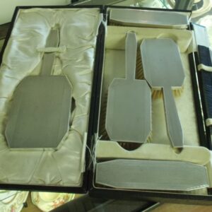 Six piece Sterling Silver Art Deco grooming set in original case with original satin linings. Each piece hallmarked B & G W London 1932