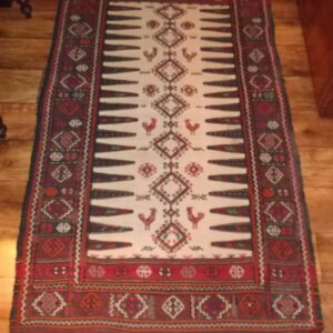 Hand knotted tribal floor rug circa 1900