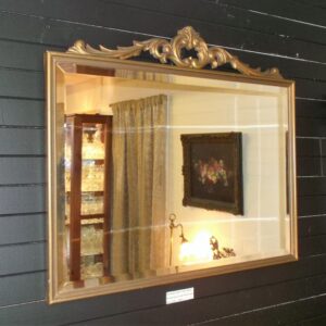 Gilt timber mirror with original bevelled glass in the French taste Circa 1950