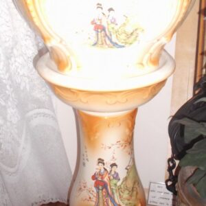Matching ceramic pedestal and jardiniere featuring Japanese decorations to both,artist’s initials underneath. England circa 1950