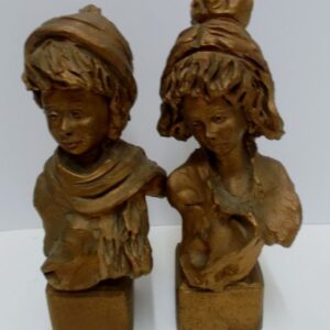 Pair of Italian gilt composite busts of a girl and a boy. Signed to back. Circa 1930.