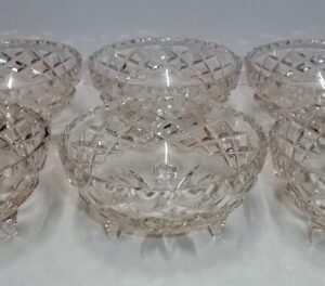 Set of six Grimwades tri footed crystal bowls