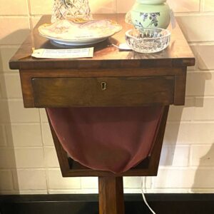 Regency rosewood ladies sewing table with front drawer and original velvet pouch England circa 1815