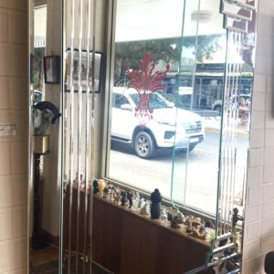 Contemporary Art Deco style mirror with detailed bevel work