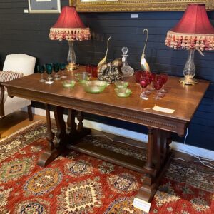 English oak dining table with applied carvings top on a decorative base England circa 1940
